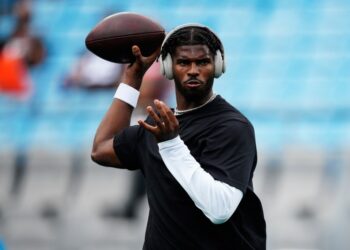 Cleveland Browns quarterback Shedeur Sanders warms up before a preseason NFL football game against the Carolina Panthers on Friday, Aug. 8, 2025, in Charlotte, N.C.