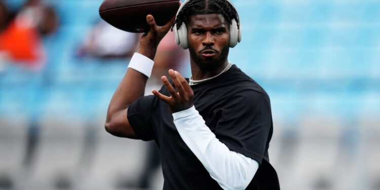 Cleveland Browns quarterback Shedeur Sanders warms up before a preseason NFL football game against the Carolina Panthers on Friday, Aug. 8, 2025, in Charlotte, N.C.