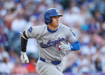 Los Angeles Dodgers baseball player running on the field.