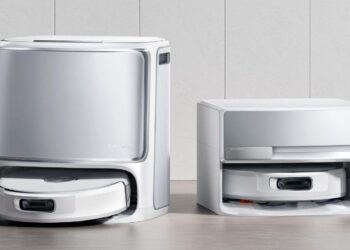 Two Narwal Flow robovacs, one with a taller base.