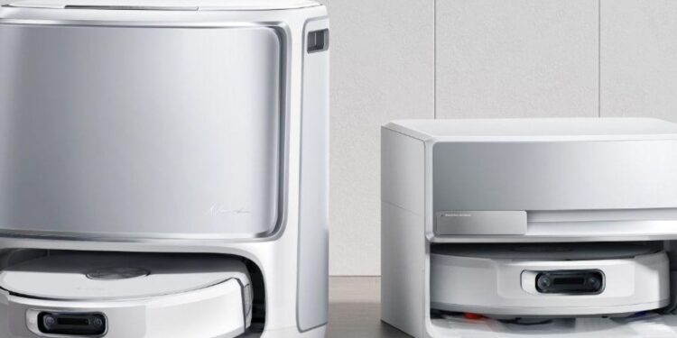 Two Narwal Flow robovacs, one with a taller base.