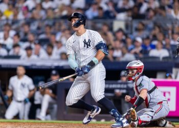 New York Yankees' Aaron Judge (99) RBI single scores Anthony Volpe (11) in the seventh inning against the Minnesota Twins at Yankee Stadium, Monday, Aug. 11, 2025, in Bronx, NY.
