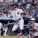 New York Yankees' Aaron Judge (99) RBI single scores Anthony Volpe (11) in the seventh inning against the Minnesota Twins at Yankee Stadium, Monday, Aug. 11, 2025, in Bronx, NY.