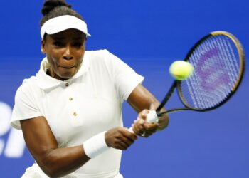 Venus Williams playing tennis at the US Open.