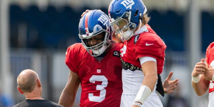 Russell Wilson and Jaxson Dart at New York Giants training camp.