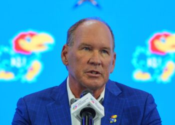 Lance Leipold speaking at a press conference.