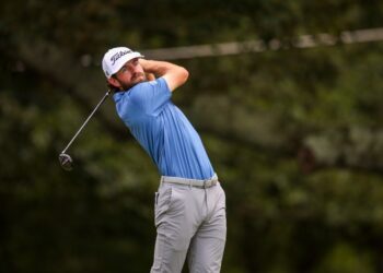 Cameron Young taking a shot during the final round of the TOUR Championship.