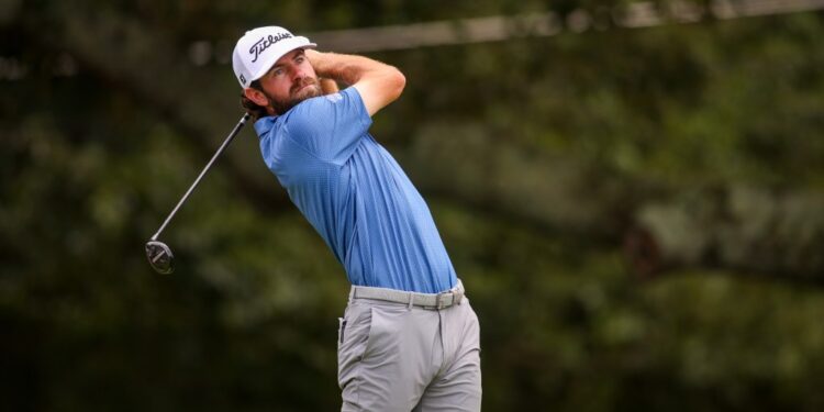 Cameron Young taking a shot during the final round of the TOUR Championship.