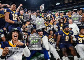 Toledo celebrates its six-overtime win over Pittsburgh.