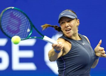 Amanda Anisimova of the USA playing tennis.