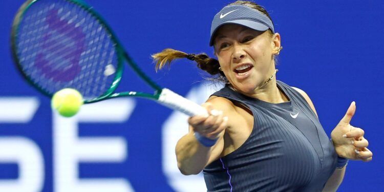 Amanda Anisimova of the USA playing tennis.