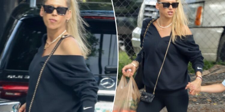 Anna Kournikova shows off baby bump in rare public appearance