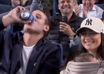 Anthony Rizzo chugs beer while taking in Yankees game with wife, baby