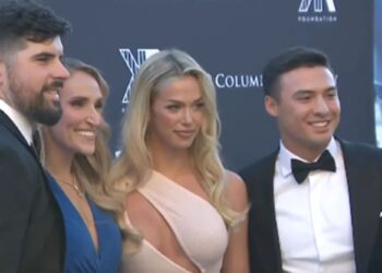 Anthony Volpe poses with stunning blonde at Yankees charity event