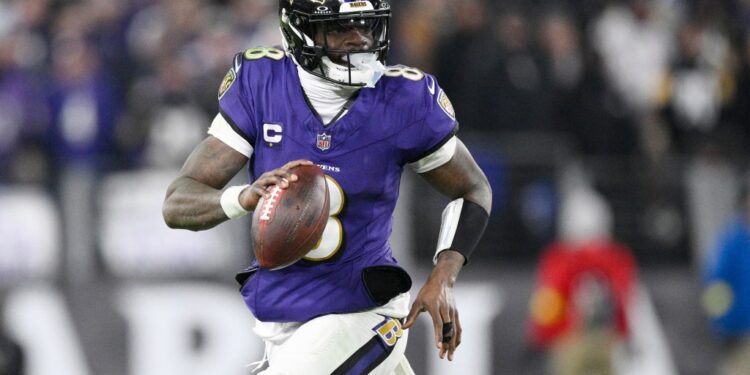 Football player Lamar Jackson in action.