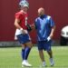 Giants head coach Brian Daboll speaking to quarterback Jaxson Dart #6, during practice at the New York Giants training facility in East Rutherford, New Jersey.