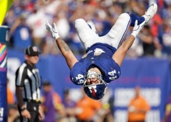 Cam Skattebo celebrates after scoring a touchdown during the Giants-Chargers game on Sept. 28, 2025.