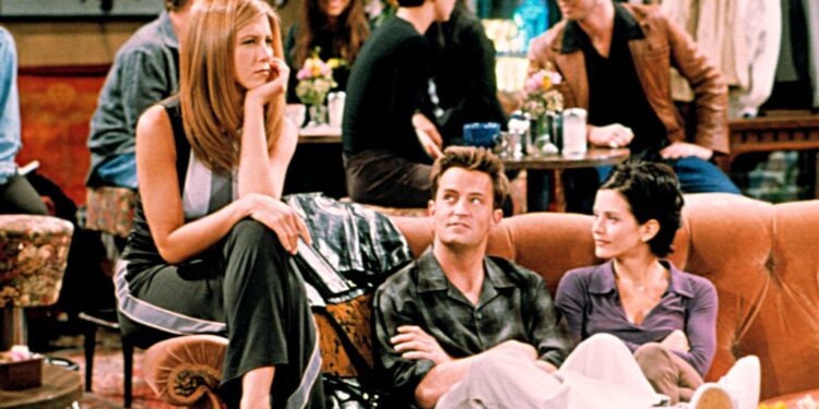 Friends: Jennifer Aniston, Matthew Perry, and Courteney Cox on the iconic orange couch at Central Perk.