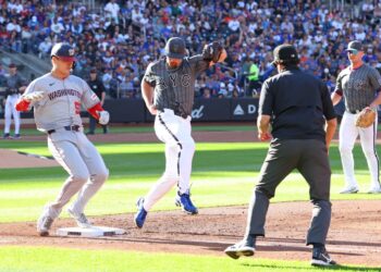 New York Mets pitcher Nolan McLean (26) misses the bag allowing Washington Nationals third base Brady House (55) on New York Mets first base Pete Alonso (20) error during the second inning when the New York Mets played the Washington Nationals Saturday, September 20, 2025 at Citi Field in Queens, NY.