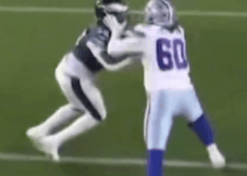 Tyler Guyton smacks Jalyx Hunt during the Cowboys-Eagles game on Sept. 4, 2025.