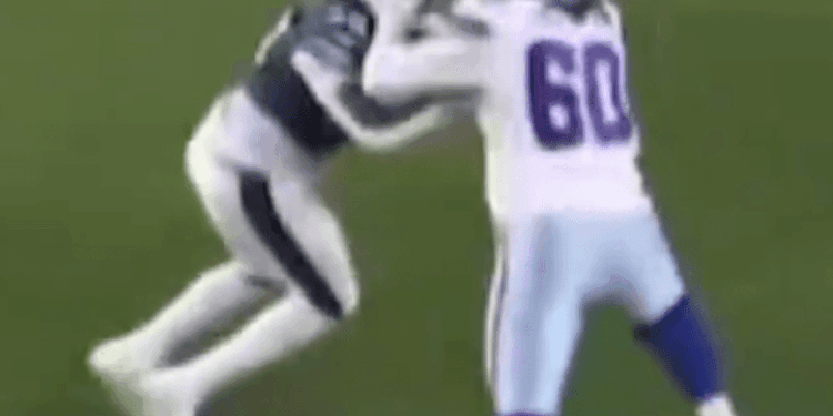 Tyler Guyton smacks Jalyx Hunt during the Cowboys-Eagles game on Sept. 4, 2025.