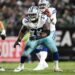 Dallas Cowboys guard Tyler Smith (73) prepares to block during the second half of an NFL football game against the Philadelphia Eagles, Thursday, Sept. 4, 2025, in Philadelphia.