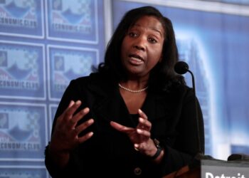 Lisa Cook, Federal Reserve Governor, speaking at a podium.A grand jury in Atlanta is looking into Cook