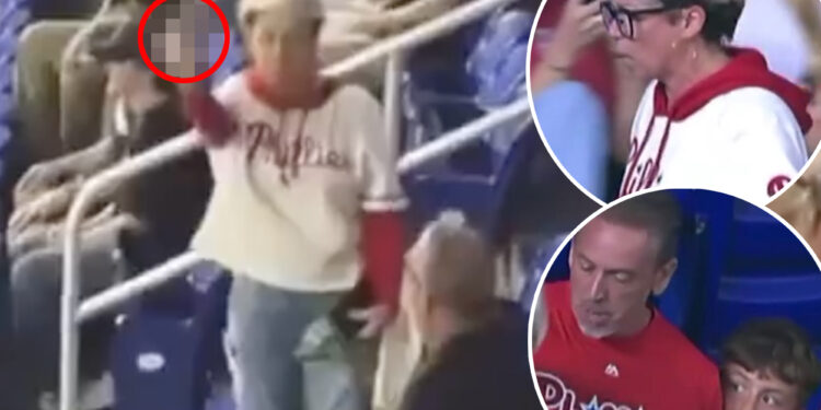 Defiant Phillies fan flips off crowd after taking ball from young boy