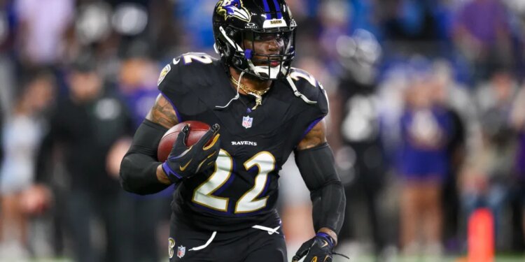 Baltimore Ravens running back Derrick Henry works out prior to a game.