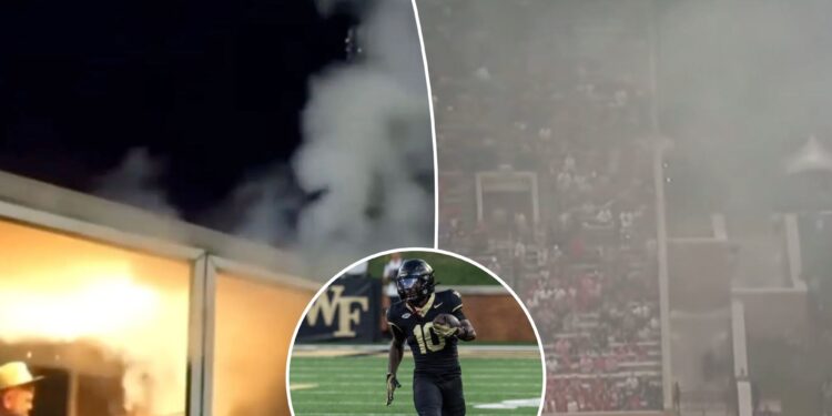 Food truck's smoke is enveloping field of college football game