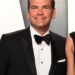 Lachlan Murdoch smiling at the 2020 Vanity Fair Oscar Party.