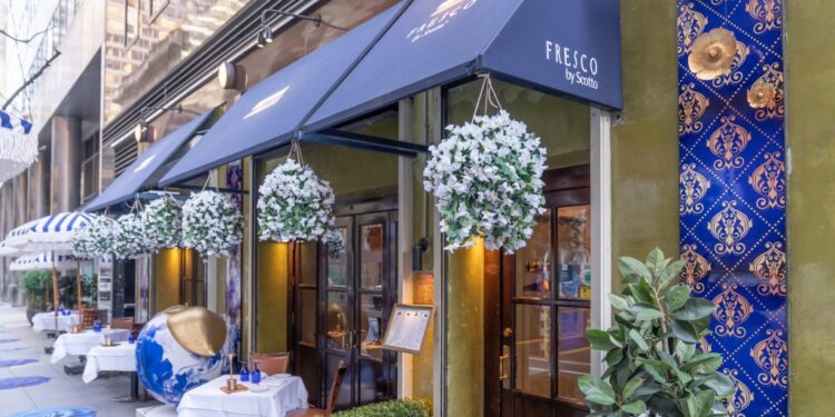 Fresco by Scotto restaurant exterior with outdoor seating.