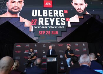 Carlos Ulberg and Dominick Reyes with Peter Kloczko at the UFC Fight Night press conference.