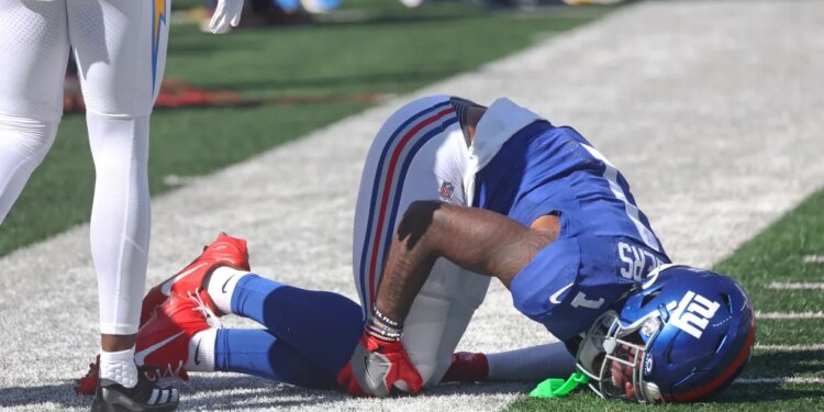Malik Nabers is injured during the Giants' win over the Chargers on Sept. 28, 2025.
