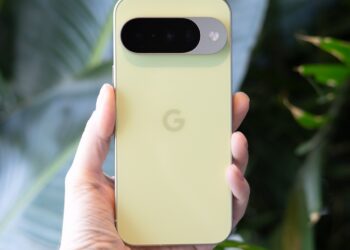 Google Pixel 10 in front of green foliage