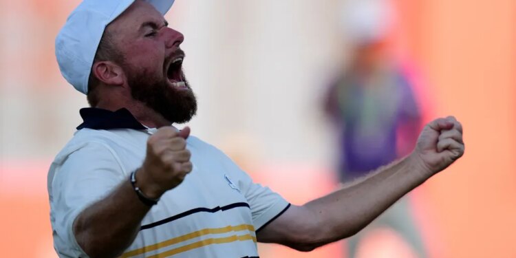 Team Europe's Shane Lowry celebrates after making the Ryder Cup-winning putt on the 18th hole at Bethpage Black on Sunday, Sept. 28, 2025.