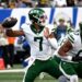 Jets quarterback Justin Fields throwing a football.