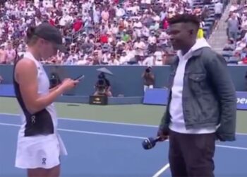 Polish tennis player Iga Swiatek delayed her post match interview to send a text message to her coach after defeating Russia's Ekaterina Alexandrova, 6-3, 6-1, in Round 4 of the 2025 US Open on Monday, September 1, 2025.