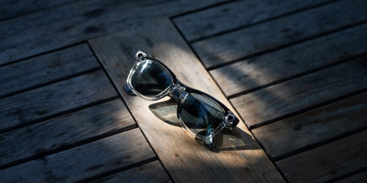 The Ray-Ban Meta smart glasses on a table.