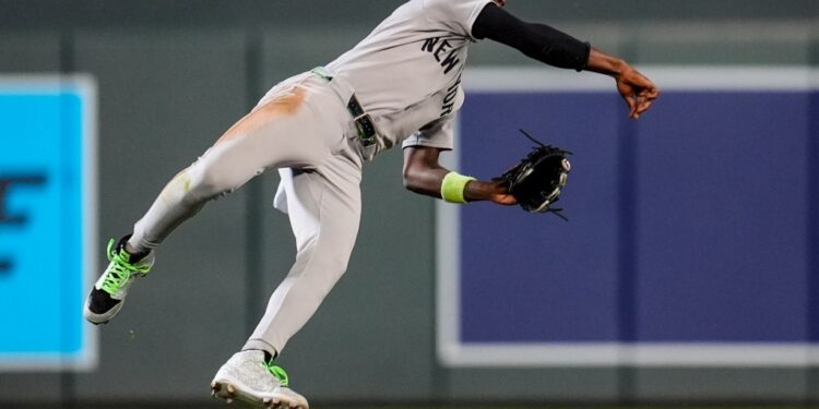 Jazz Chisholm makes an acrobatic play to rob Brooks Lee of a hit in the fourth inning o the Yankees' 10-5 road win over the Twins on Sept. 17, 2025.