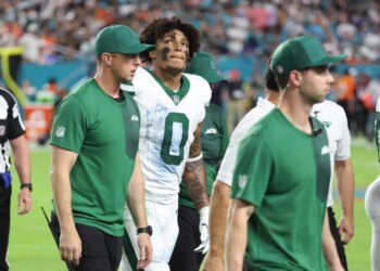 New York Jets Braelon Allen is taken off the field by trainers during the second quarter.