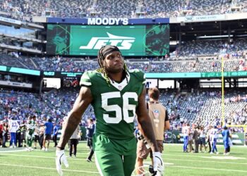 Quincy Williams walks off the field after the Jets-Bills game on Sept. 14, 2025.