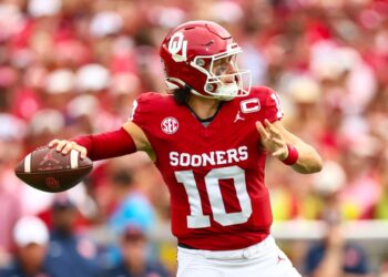 Oklahoma Sooners quarterback John Mateer (10) throws during the first half against the Auburn Tigers at Gaylord Family-Oklahoma Memorial Stadium.