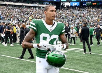 Jets wide receiver Josh Reynolds (83) reacts as he walks off the field.