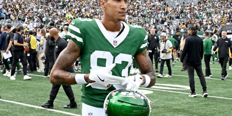 Jets wide receiver Josh Reynolds (83) reacts as he walks off the field.