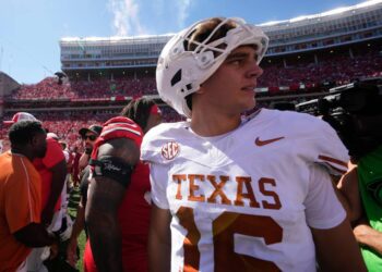 Arch Manning, Texas Longhorns quarterback #16, leaving the field.