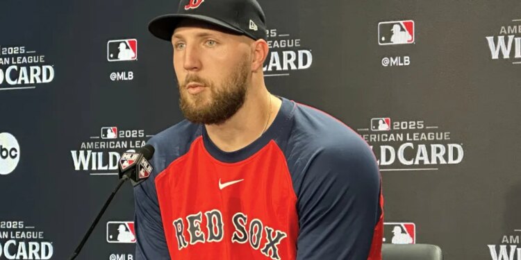 Boston Red Sox pitcher Garrett Crochet speaks at a press conference.