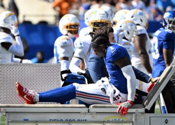 Giants wide receiver Malik Nabers (1) is transported off the field on a cart after an injury.