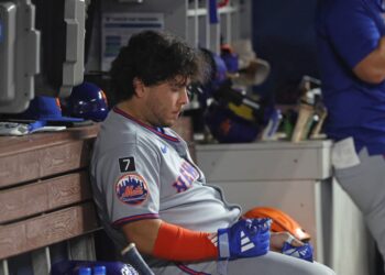 Francisco Alvarez #4 of the New York Mets reacts in the dugout after he grounds out to the catcher during the 9th inning. The Miami Marlins defeat the New York Mets 6-2.