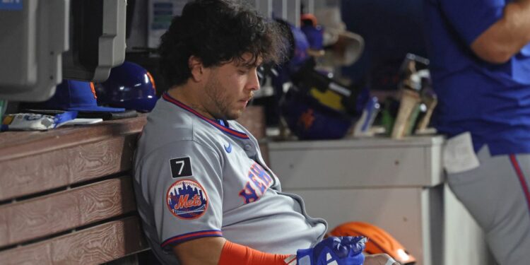 Francisco Alvarez #4 of the New York Mets reacts in the dugout after he grounds out to the catcher during the 9th inning. The Miami Marlins defeat the New York Mets 6-2.
